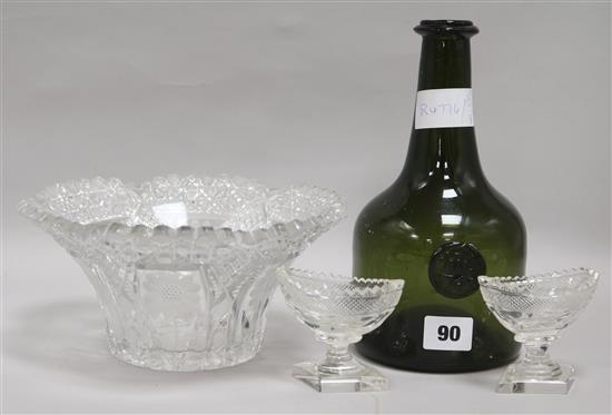 A cut glass bowl, two salts and a wine bottle, bottle height 23cm